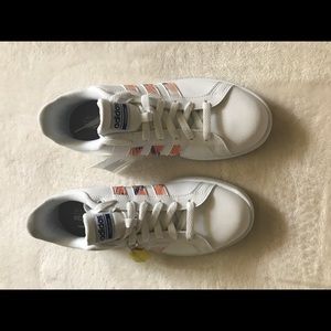 Blue and pink adidas shoes